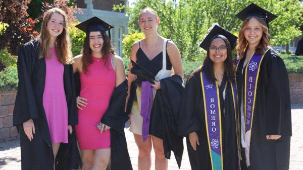 Women in various graduation attire